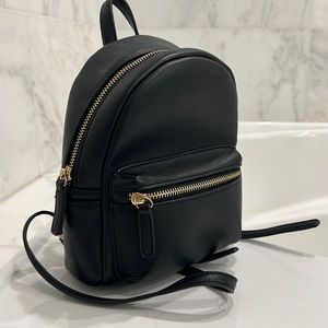 Mini black backpack